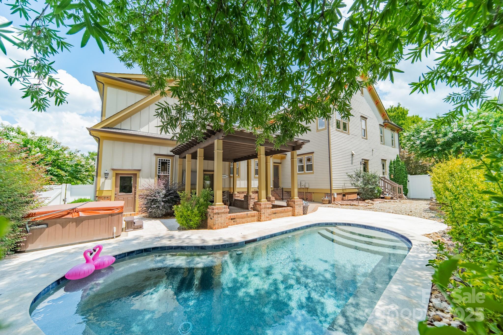 406 Bull Finch Bend Fort Mill, SC 29708 - Photo 37 of 48 a view of a house with backyard and sitting area