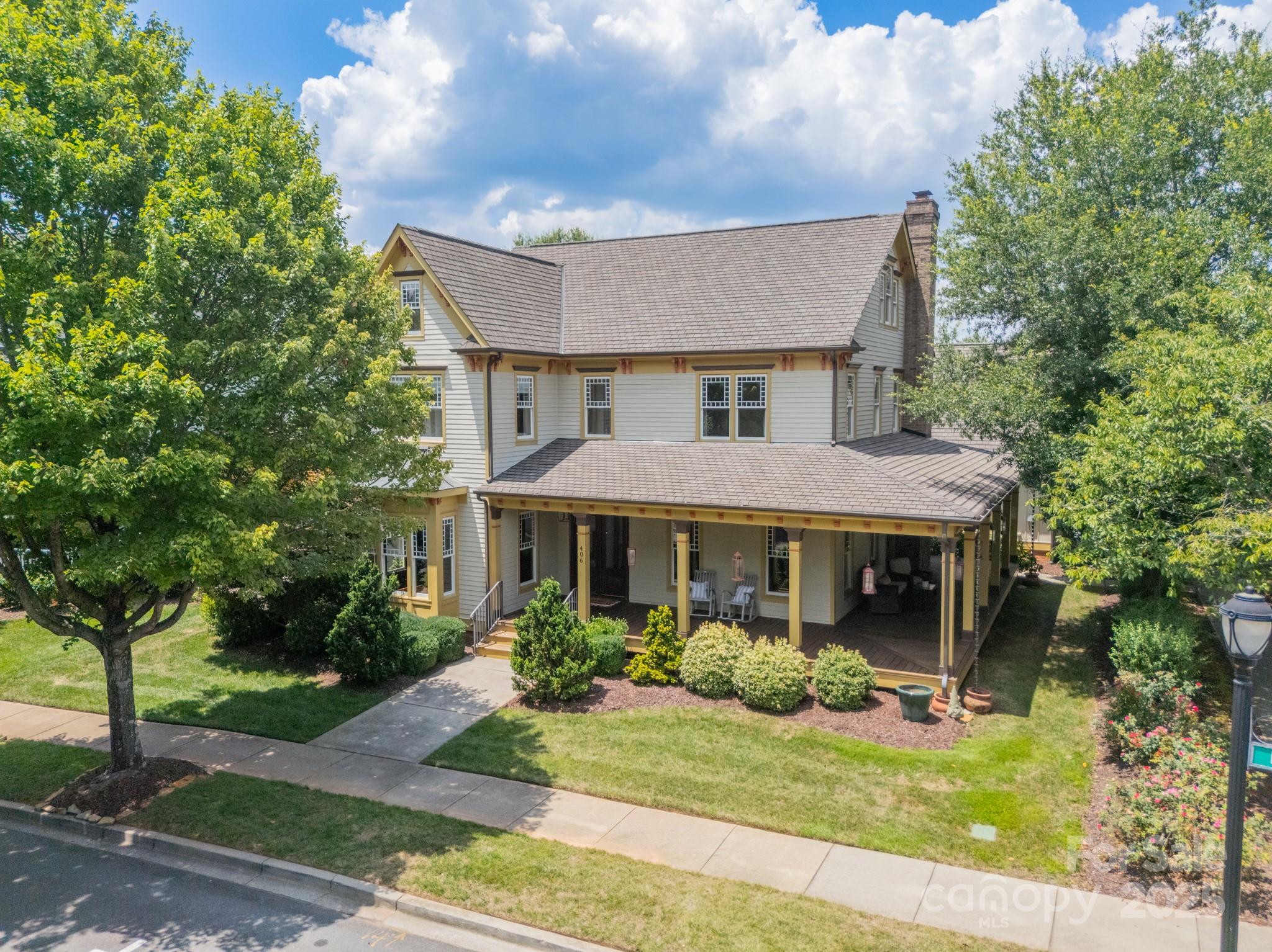 406 Bull Finch Bend Fort Mill, SC 29708 - Photo 43 of 48 a front view of a house with garden