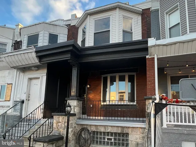 a front view of a house with a front door