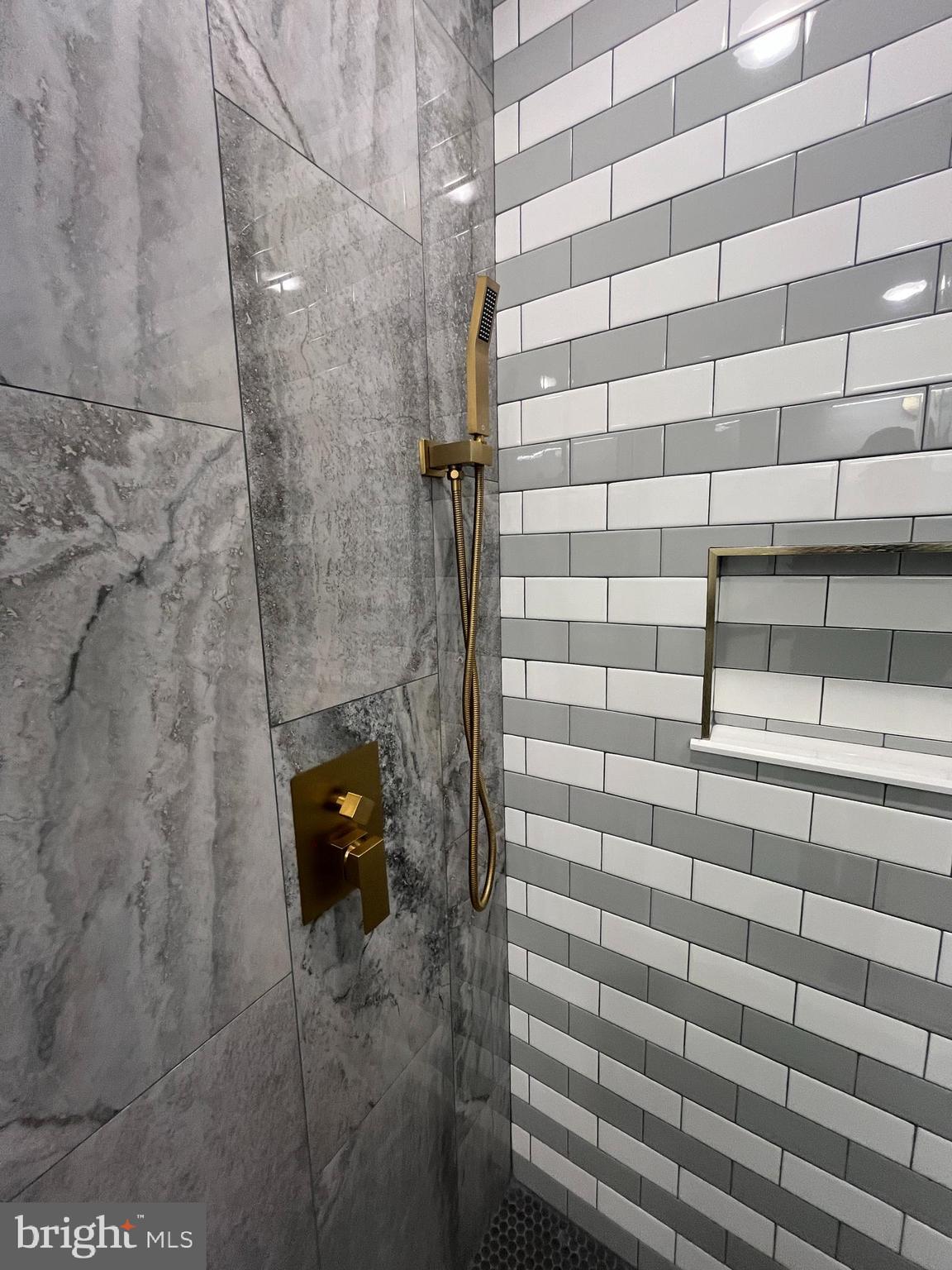 5712 Cedar Avenue Philadelphia, PA 19143 - Photo 26 of 56 a bathroom with a shower