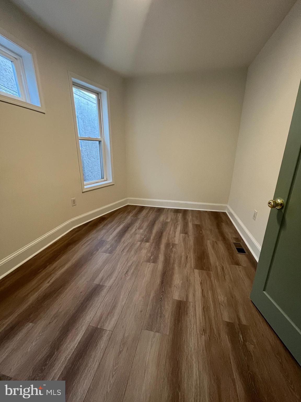 5712 Cedar Avenue Philadelphia, PA 19143 - Photo 38 of 56 a view of an empty room and window