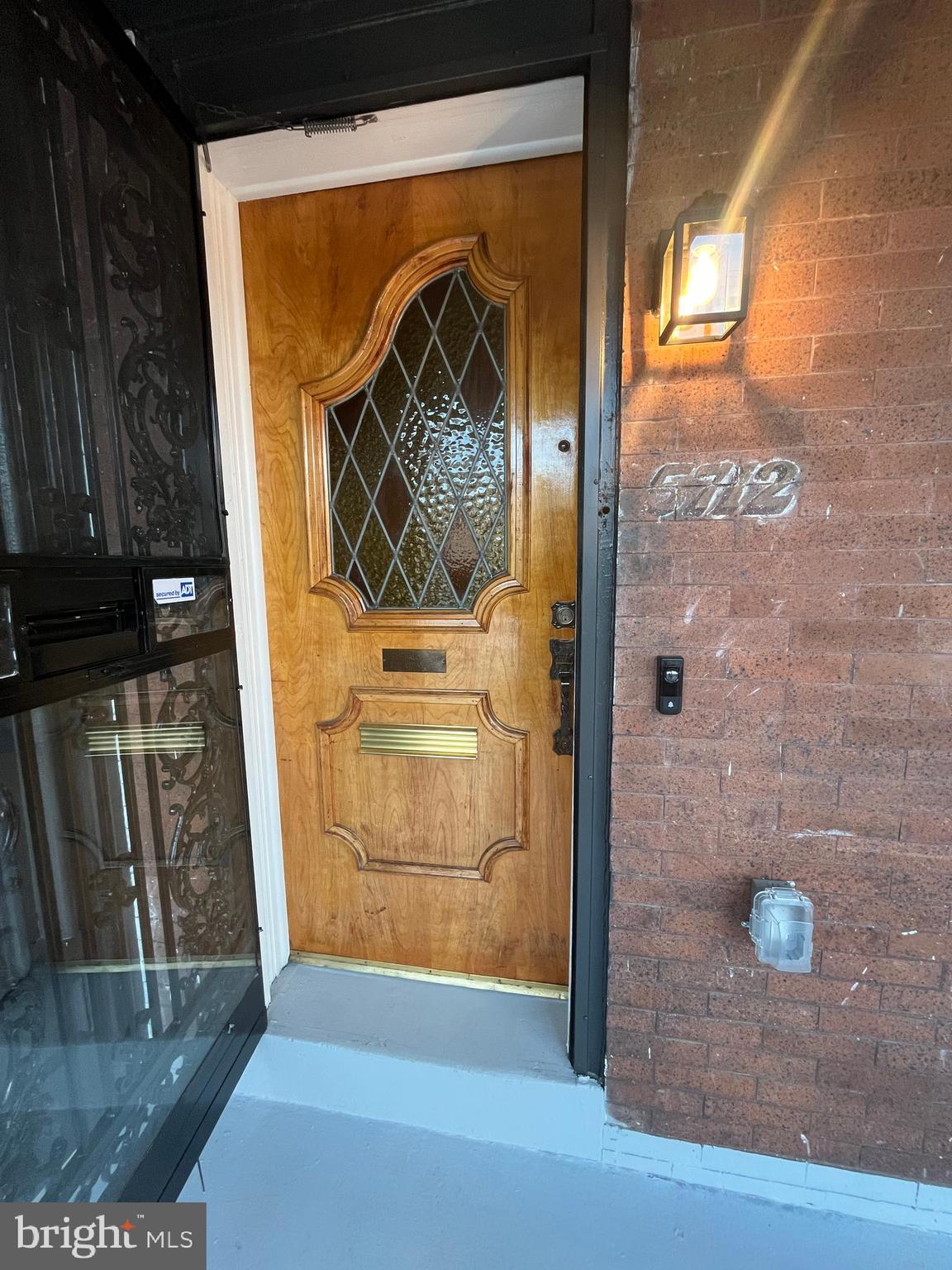 5712 Cedar Avenue Philadelphia, PA 19143 - Photo 44 of 56 a view of front door of house