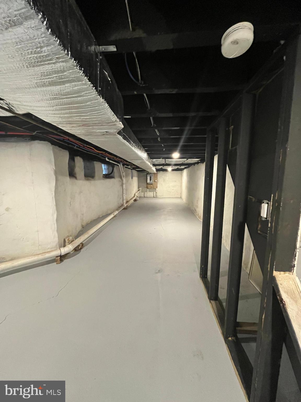 5712 Cedar Avenue Philadelphia, PA 19143 - Photo 47 of 56 a view of an empty room with wooden floor