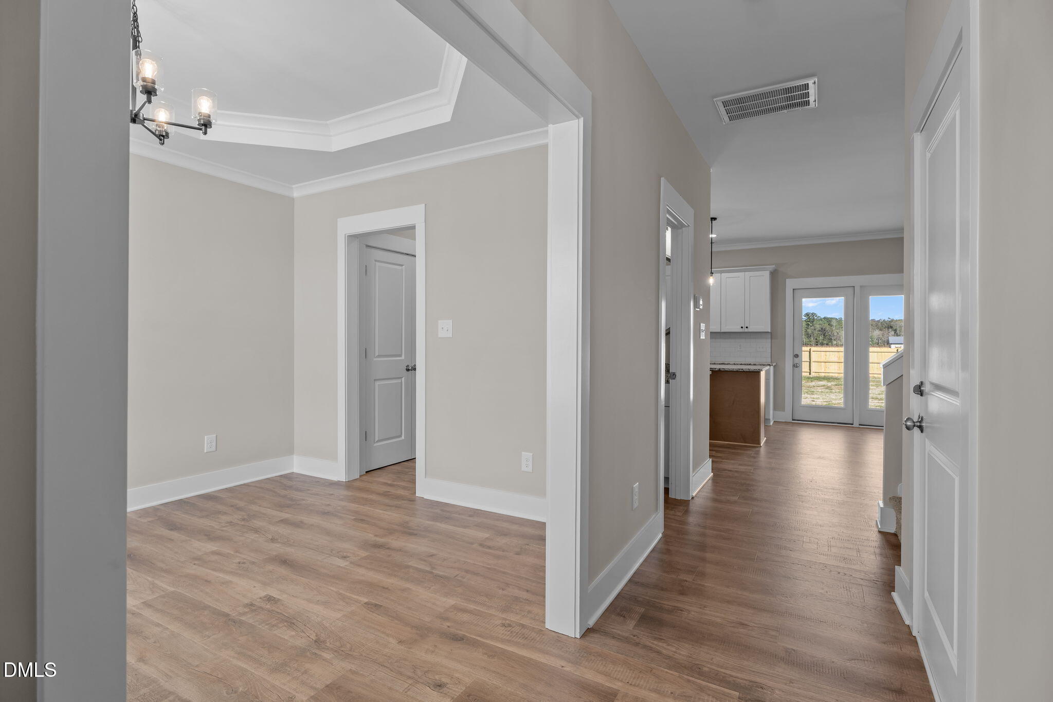 262 Fields Road Pikeville, NC 27863 - Photo 11 of 43 a view of a hallway with wooden floor