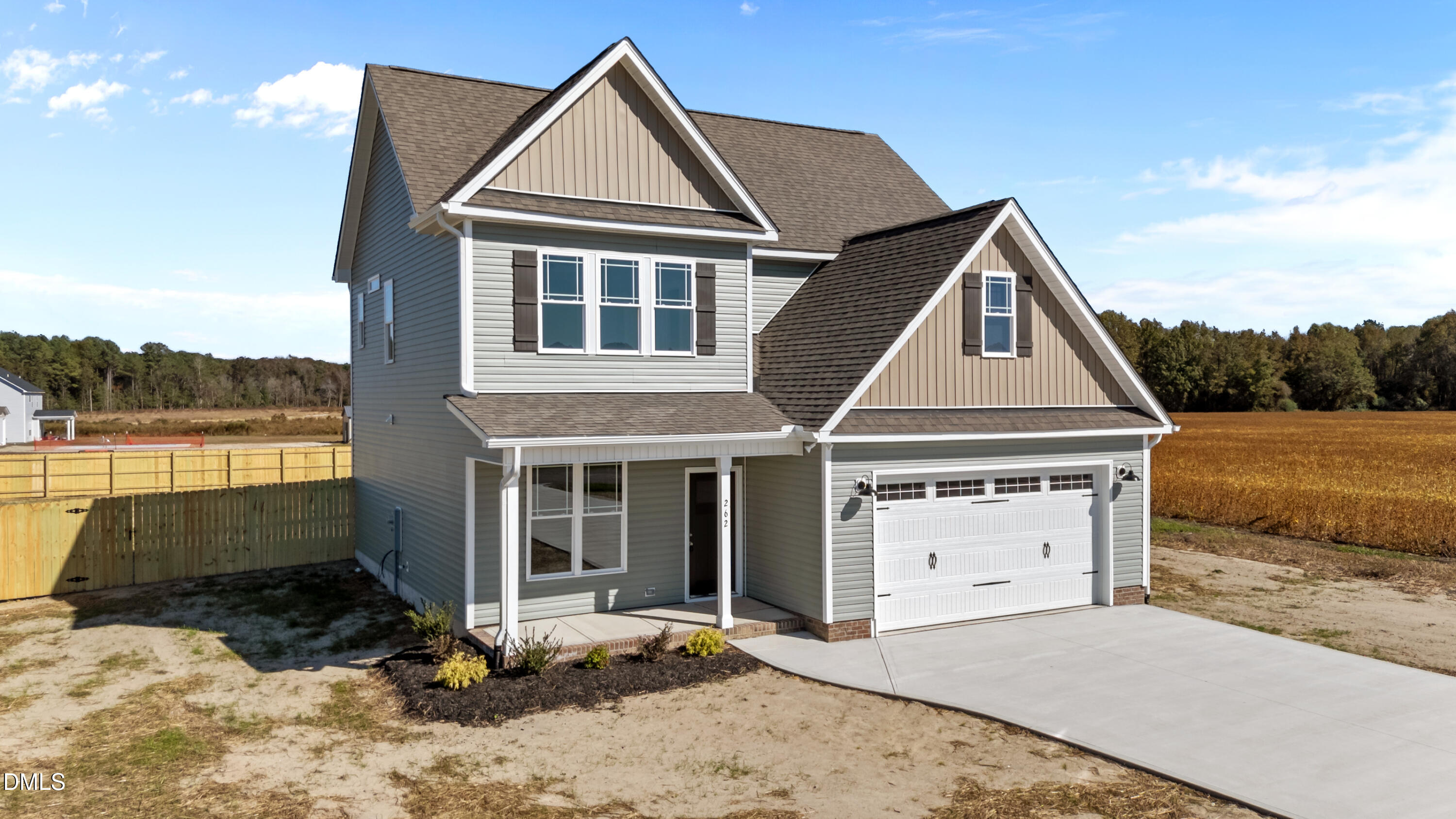 262 Fields Road Pikeville, NC 27863 - Photo 2 of 43 a front view of a house with a yard