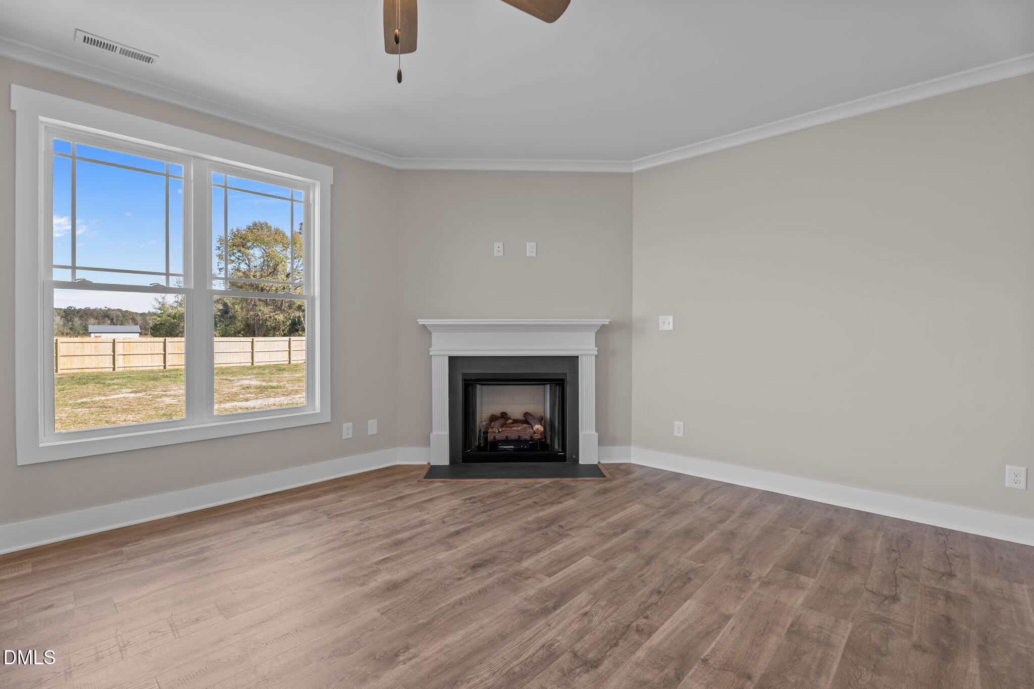 262 Fields Road Pikeville, NC 27863 - Photo 21 of 43 a view of an empty room with a window