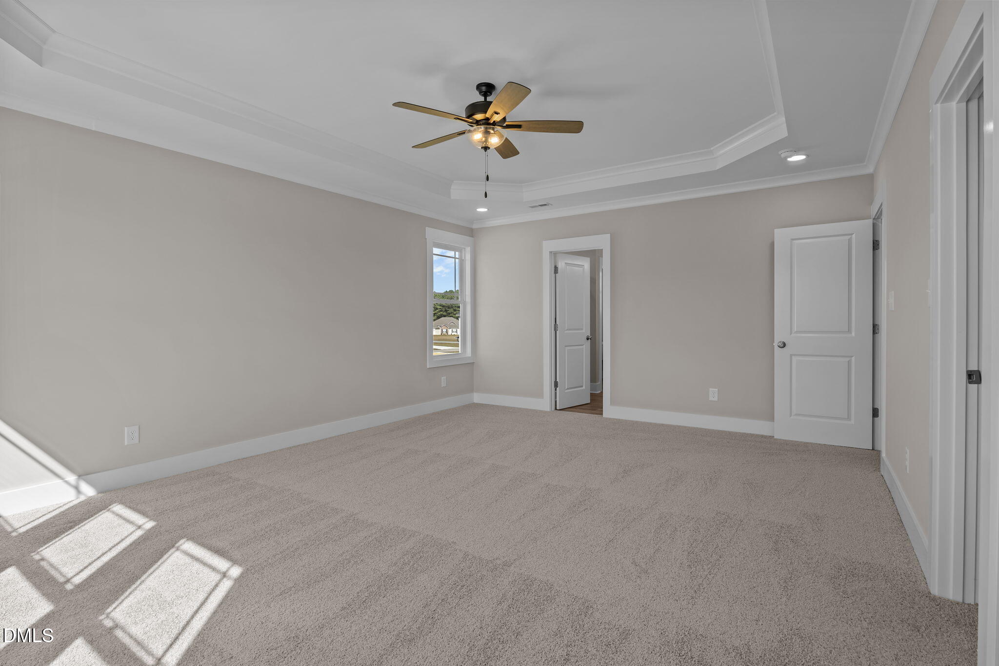 262 Fields Road Pikeville, NC 27863 - Photo 25 of 43 a view of an empty room with a ceiling fan and window