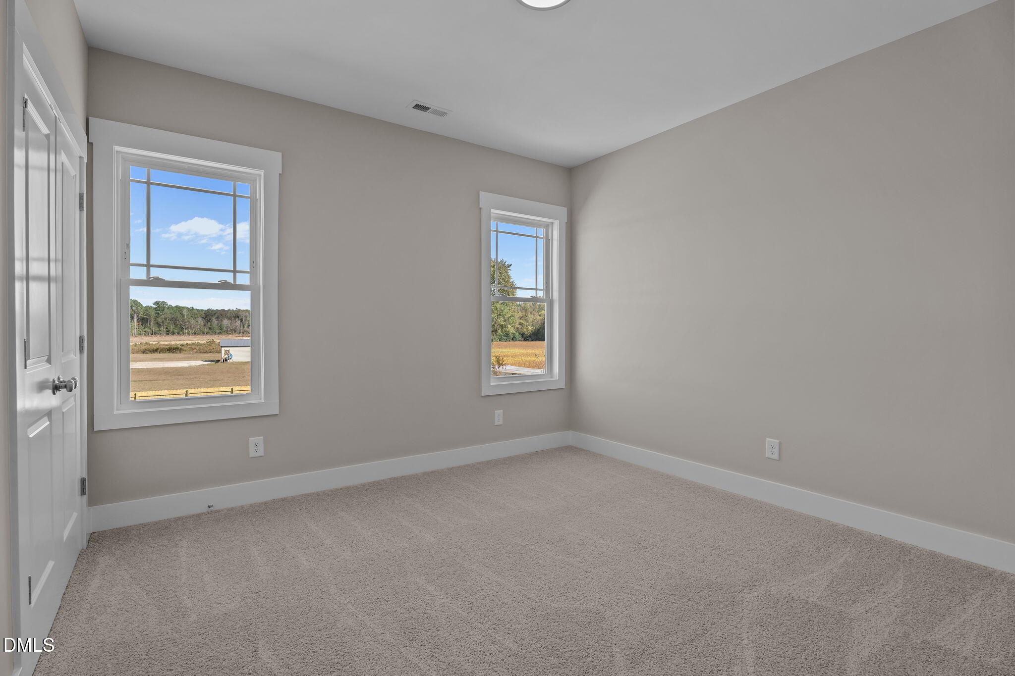 262 Fields Road Pikeville, NC 27863 - Photo 34 of 43 an empty room with windows