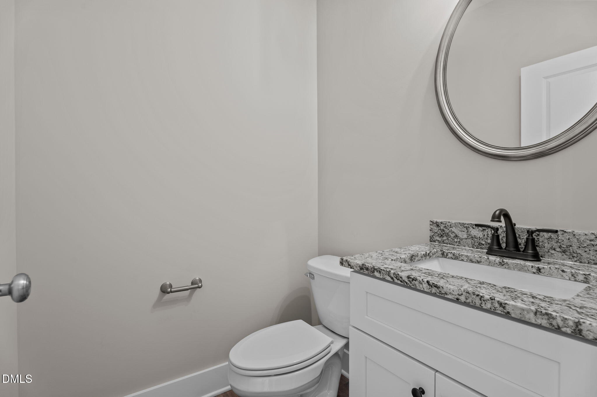 262 Fields Road Pikeville, NC 27863 - Photo 37 of 43 a bathroom with a granite countertop sink mirror vanity and toilet