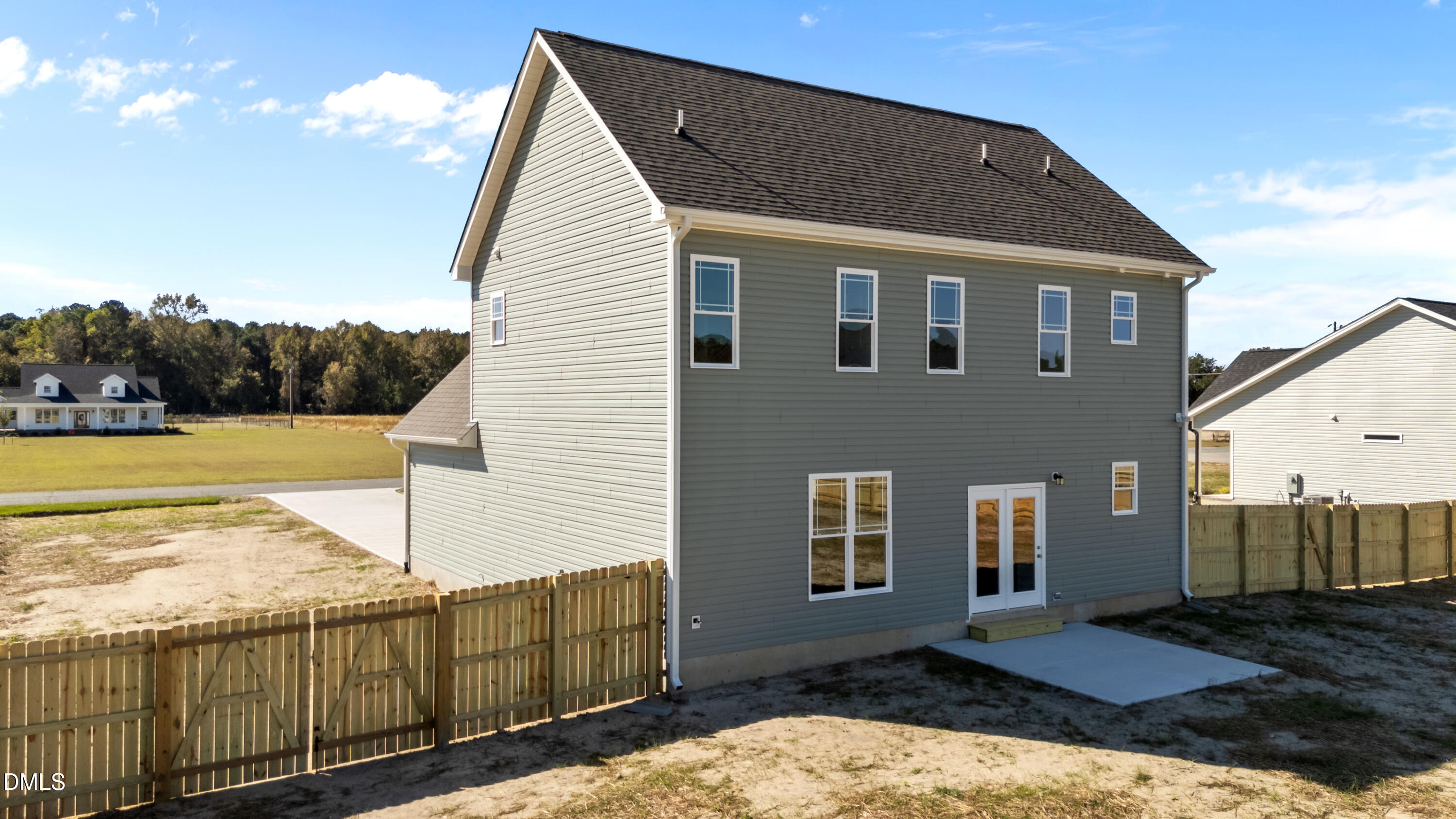 262 Fields Road Pikeville, NC 27863 - Photo 39 of 43 a view of a house with backyard and trees