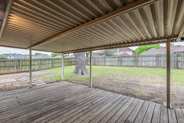 a view of a backyard of a house
