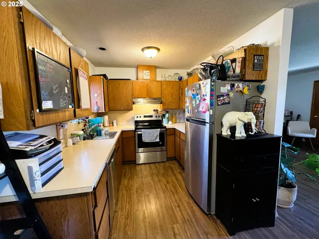a bedroom with bed and a window