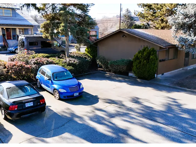 a car parked in front of a house
