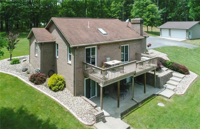 180 Pine Tract Road Butler, PA 16001 - Photo 3 of 25 Imagine enjoying dinner or entertaining in private and looking over a lush back yard and woods.