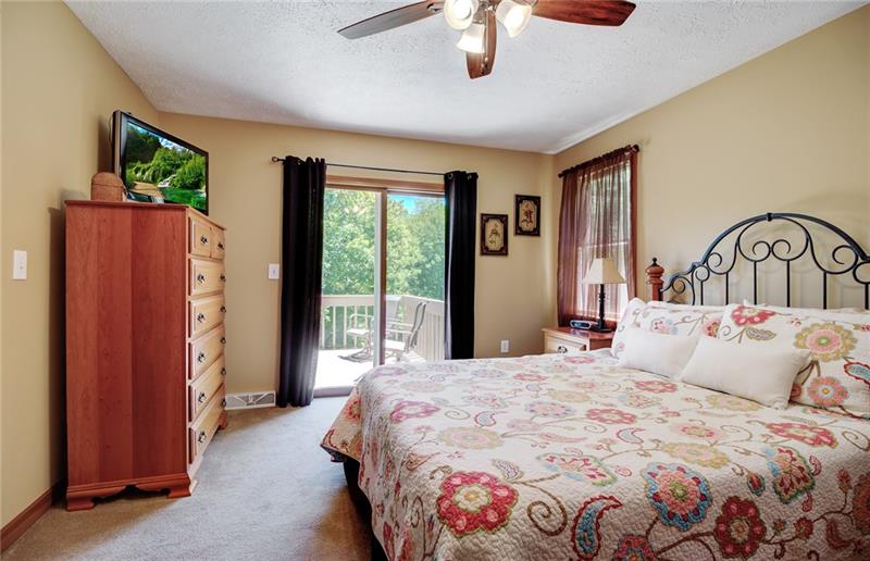 180 Pine Tract Road Butler, PA 16001 - Photo 22 of 25 Step outside of the master bedroom and you are enjoying the upper tier of the deck.