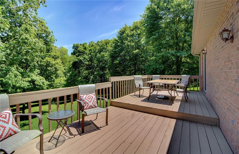 180 Pine Tract Road Butler, PA 16001 - Photo 8 of 25 The upper tier deck is accessed from the master bedroom. The lower level of the deck can be easily accessed from the family room.