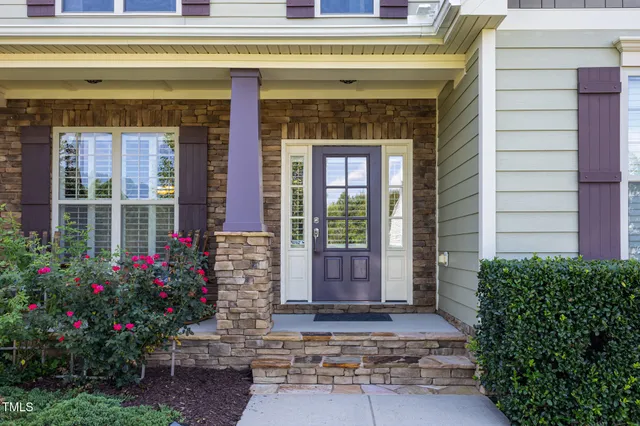 a front view of a house with a porch