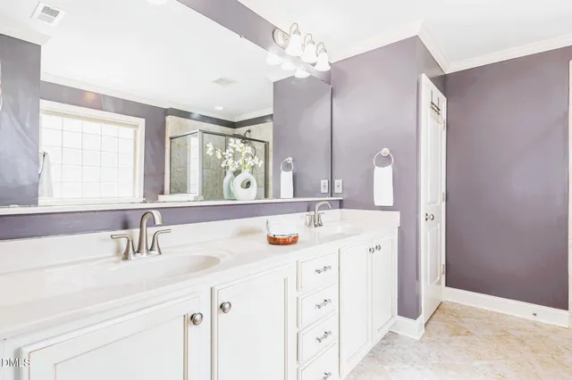 an aerial view of a house with a garden