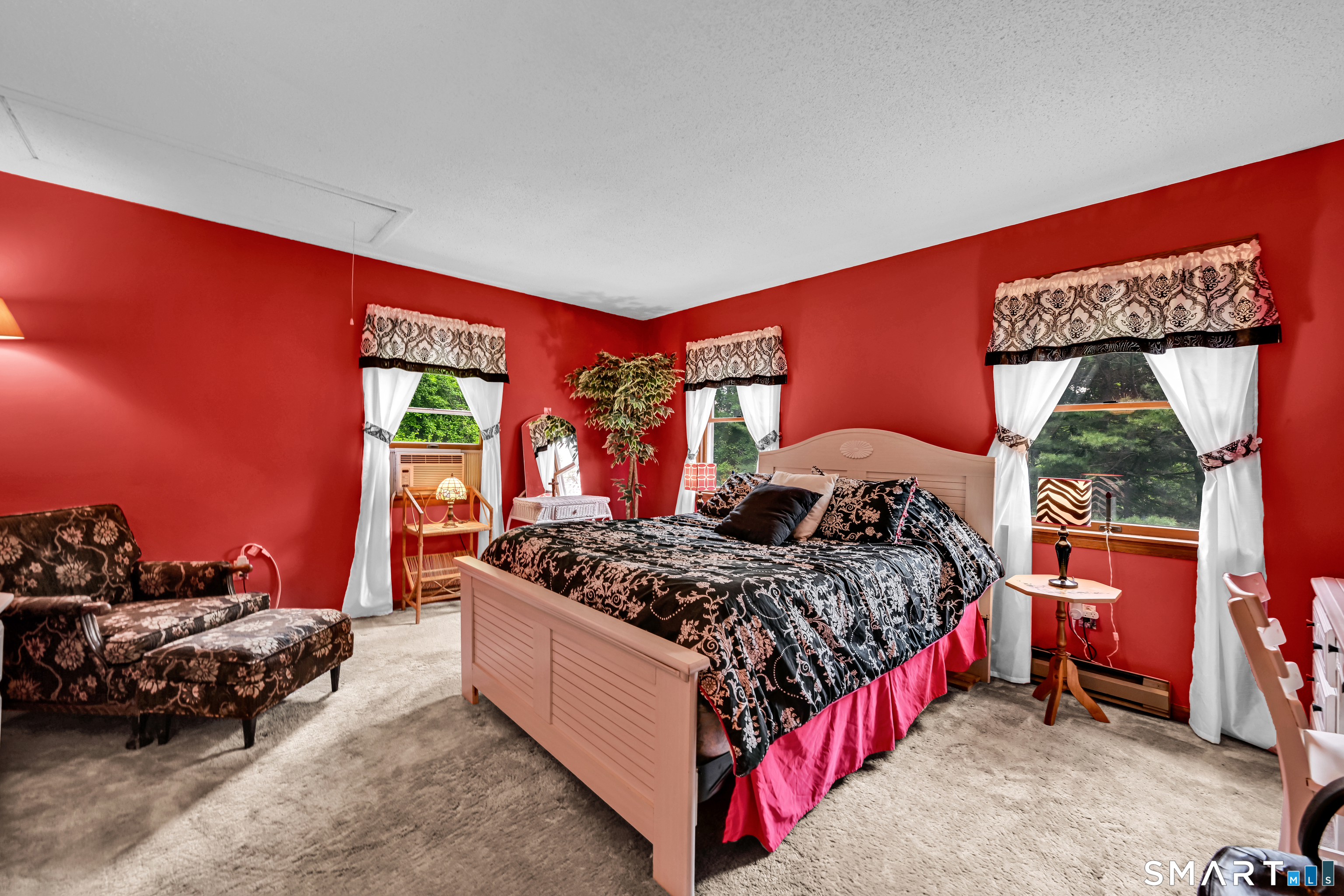155 Lake Harwinton Road Harwinton, CT 06791 - Photo 27 of 39 a bed room with a bed and a couch