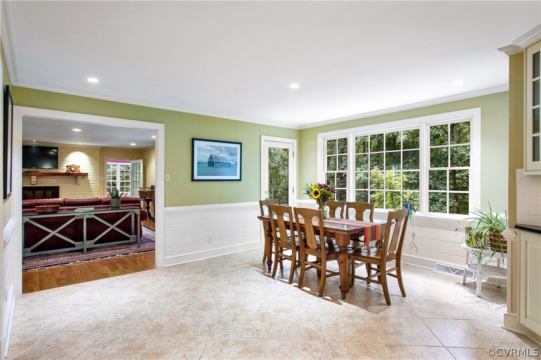 14140 Netherfield Drive Midlothian, VA 23113 - Photo 14 of 48 a view of a dining room and hall with furniture