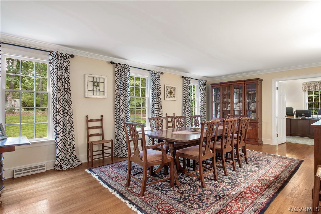 14140 Netherfield Drive Midlothian, VA 23113 - Photo 17 of 48 a view of a dining room with furniture window and wooden floor