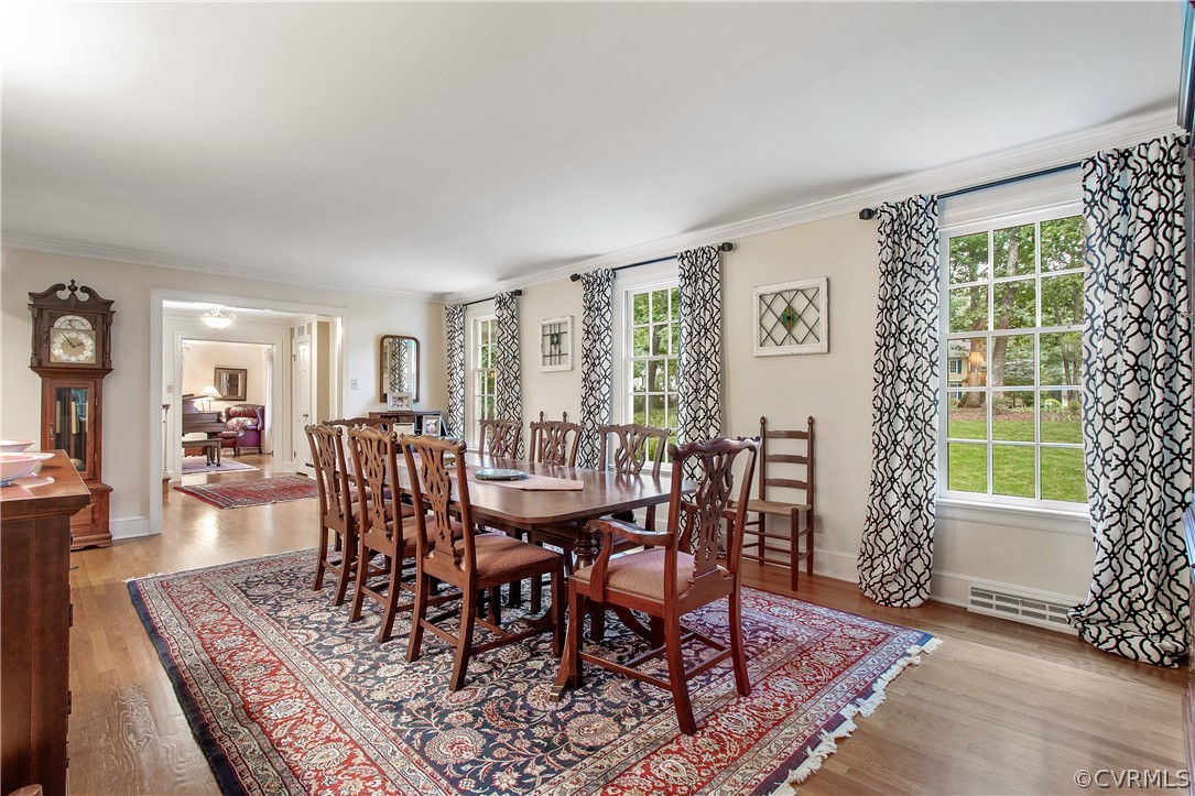 14140 Netherfield Drive Midlothian, VA 23113 - Photo 18 of 48 a view of a dining room with furniture window and wooden floor