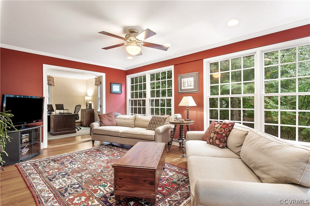 14140 Netherfield Drive Midlothian, VA 23113 - Photo 21 of 48 a living room with furniture and a flat screen tv