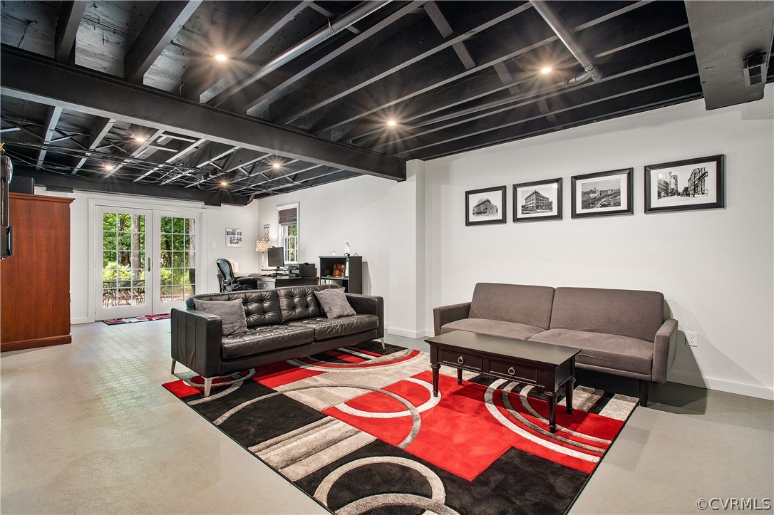 14140 Netherfield Drive Midlothian, VA 23113 - Photo 38 of 48 a living room with furniture and a flat screen tv