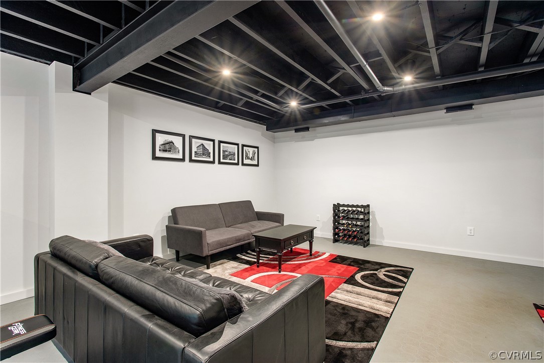14140 Netherfield Drive Midlothian, VA 23113 - Photo 40 of 48 a living room with furniture and a couch