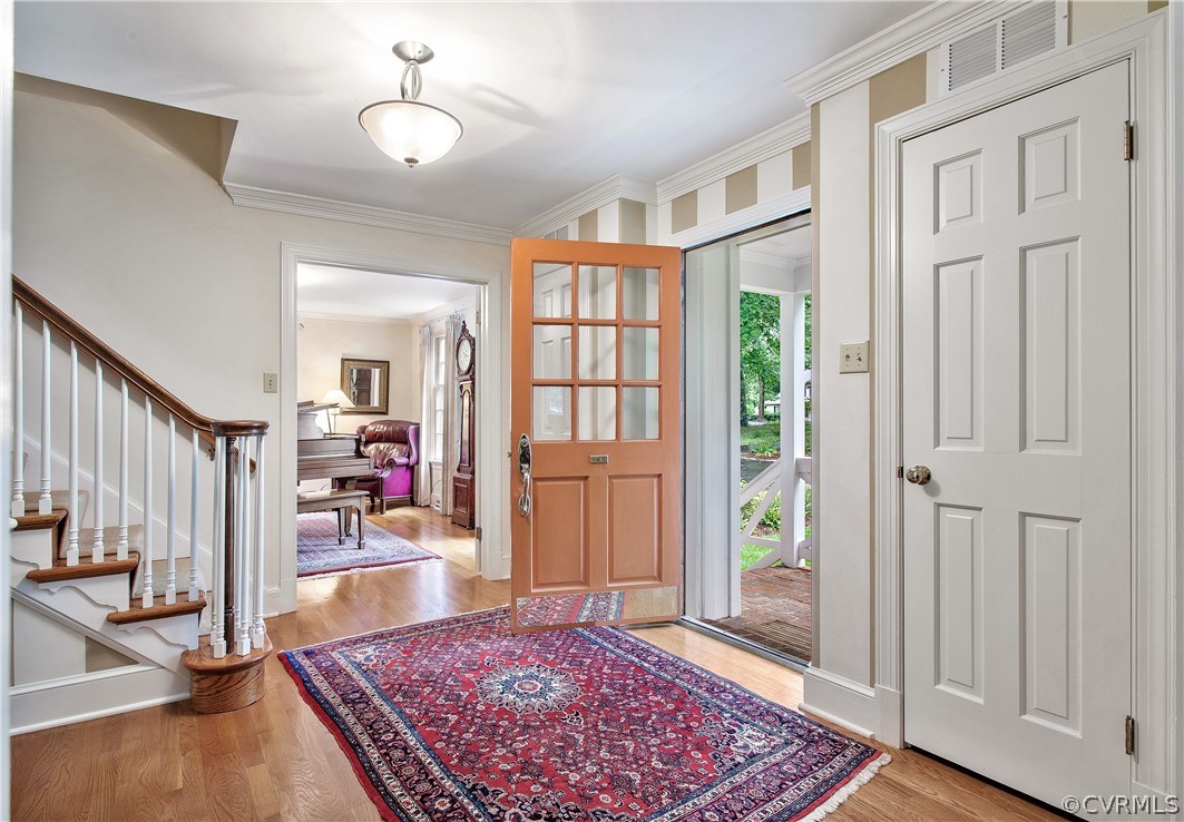 14140 Netherfield Drive Midlothian, VA 23113 - Photo 4 of 48 a view of a livingroom with wooden floor and a rug