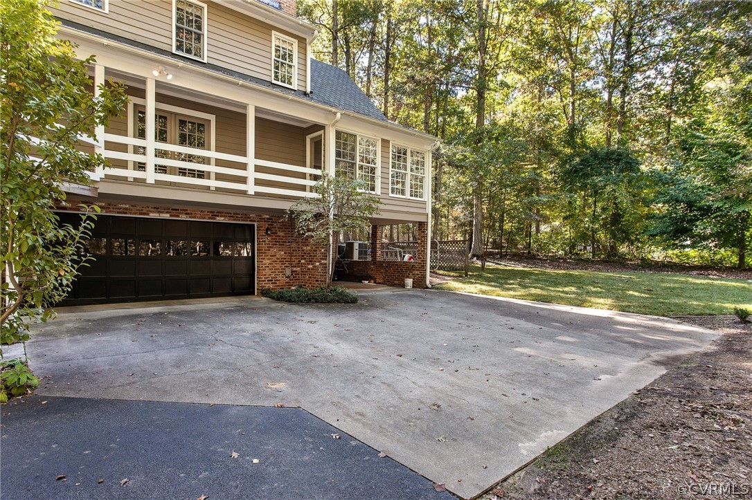 14140 Netherfield Drive Midlothian, VA 23113 - Photo 42 of 48 a front view of a house with a yard
