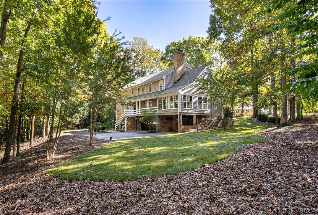 14140 Netherfield Drive Midlothian, VA 23113 - Photo 47 of 48 a view of a house with a yard