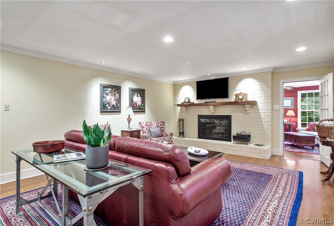 14140 Netherfield Drive Midlothian, VA 23113 - Photo 6 of 48 a living room with furniture flat screen tv and a fireplace