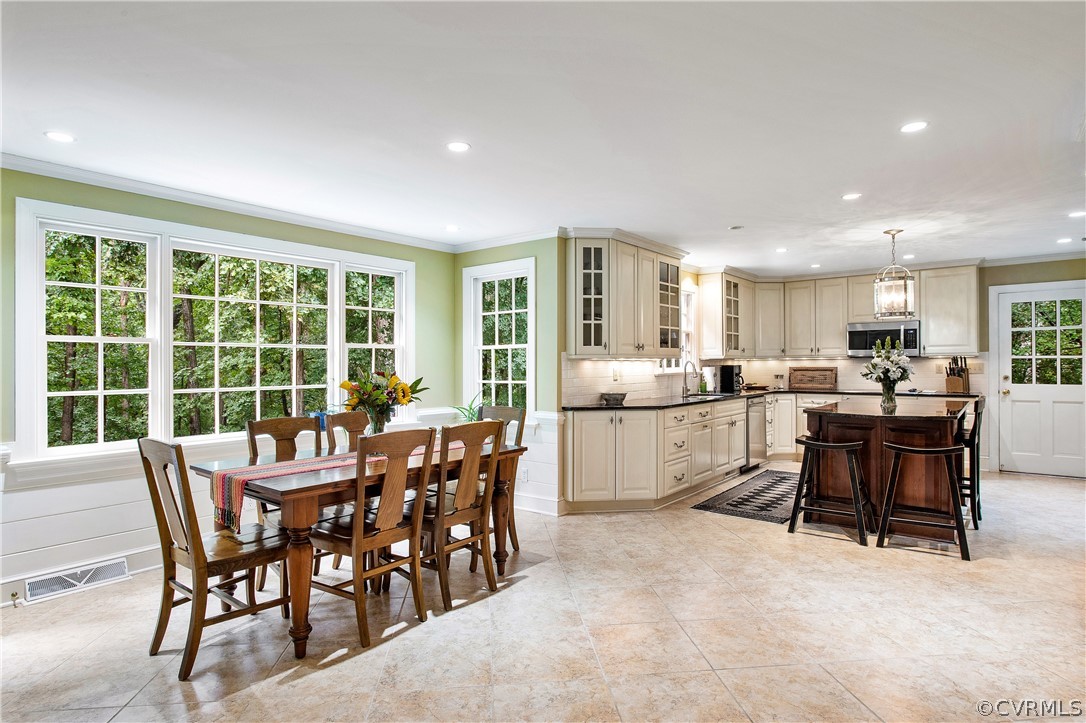 14140 Netherfield Drive Midlothian, VA 23113 - Photo 9 of 48 a view of a dining room and livingroom with furniture