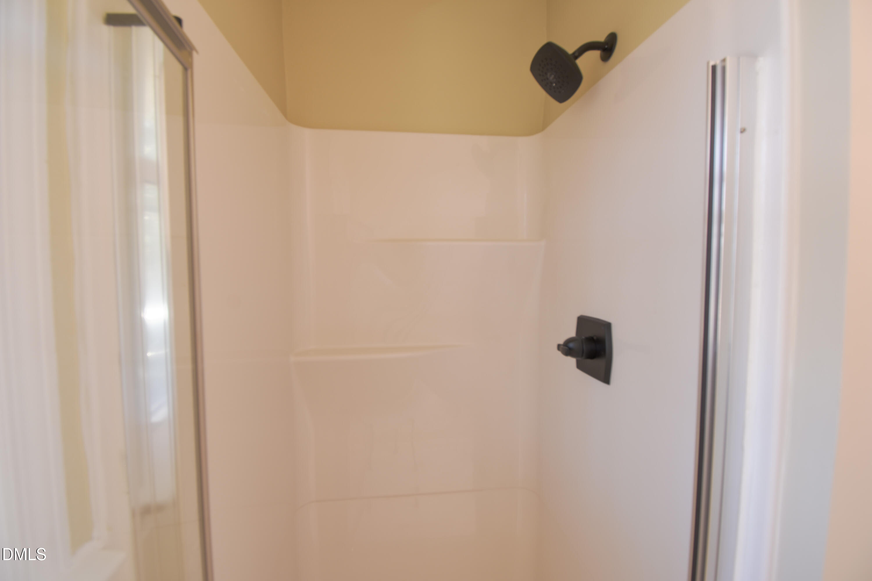 1412 Chamblee Road Zebulon, NC 27597 - Photo 9 of 22 a bathroom with a shower