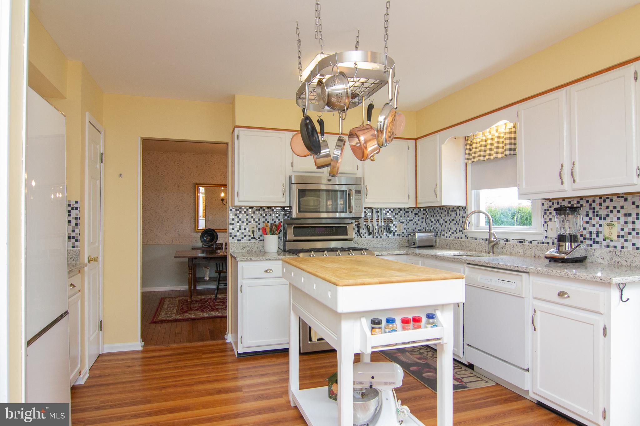 4208 Arthur Shipley Road Westminster, MD 21157 - Photo 10 of 35 Island & pot rack in spacious kitchen