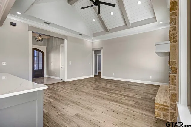 a view of an empty room and window