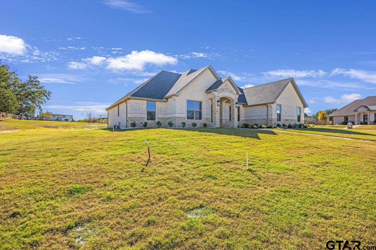 15531 Sugar Rdg Lane Flint, TX 75762 - Photo 3 of 45 a view of a house with a big yard and large trees