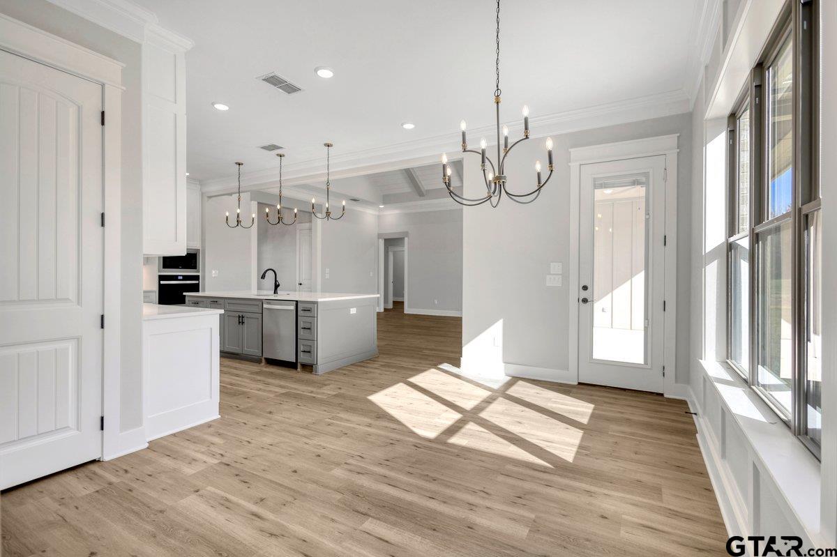 15531 Sugar Rdg Lane Flint, TX 75762 - Photo 35 of 45 a view of a kitchen with wooden floor and windows