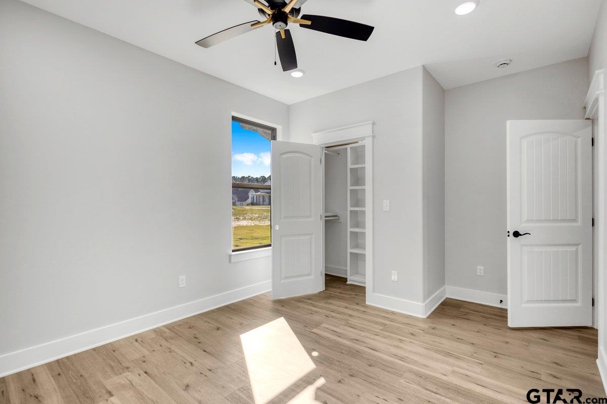 15531 Sugar Rdg Lane Flint, TX 75762 - Photo 39 of 45 wooden floor in an empty room with a window