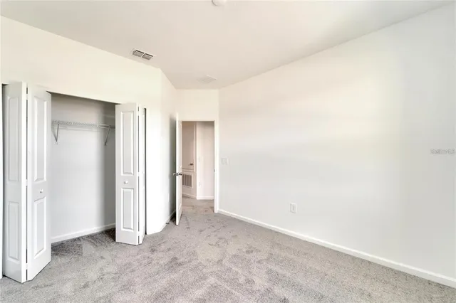 an empty room with closet