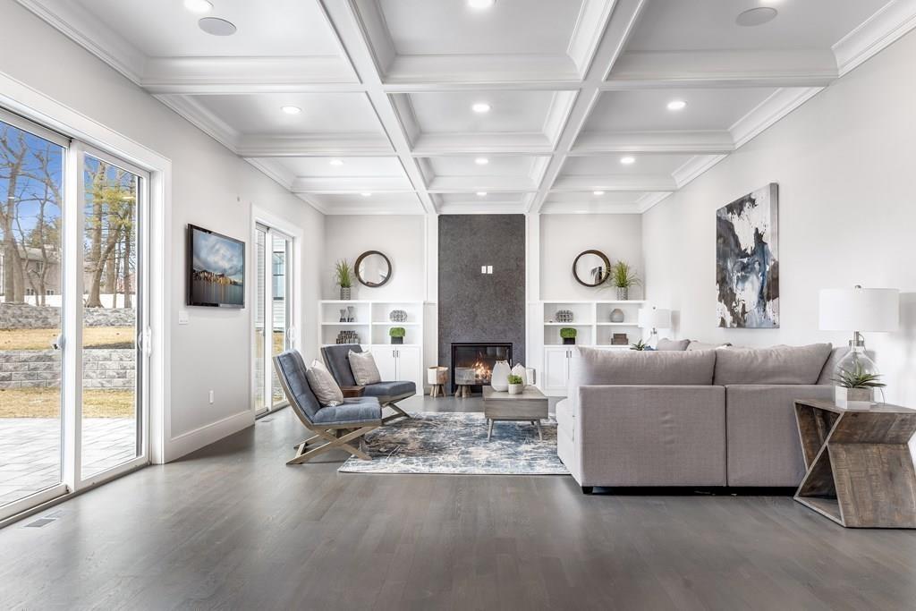819 Dedham Street Newton, MA 02459 - Photo 12 of 40 a living room with furniture and a large window