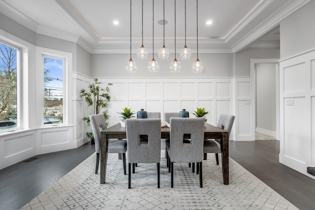 819 Dedham Street Newton, MA 02459 - Photo 14 of 40 a view of a dining room with furniture window and wooden floor