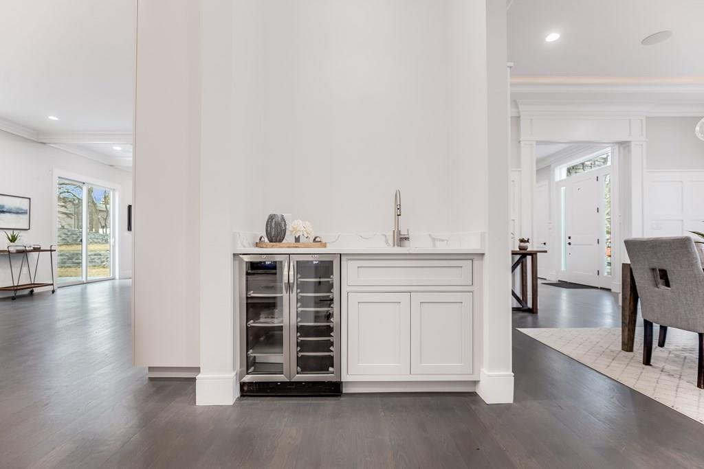 819 Dedham Street Newton, MA 02459 - Photo 15 of 40 a view of kitchen with furniture and wooden floor
