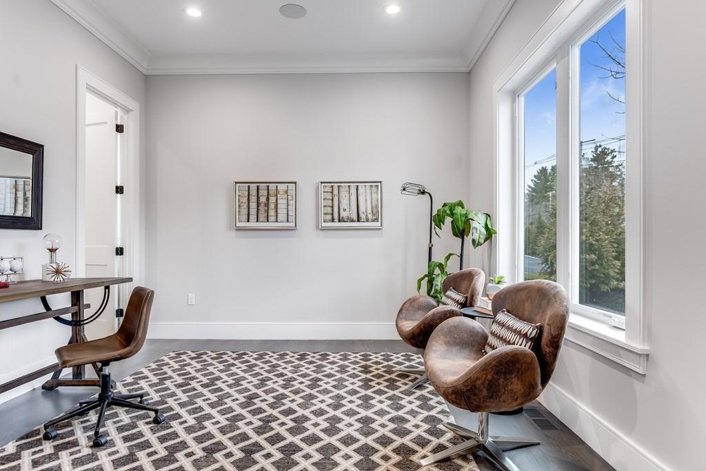 819 Dedham Street Newton, MA 02459 - Photo 16 of 40 a living room with furniture and a large window