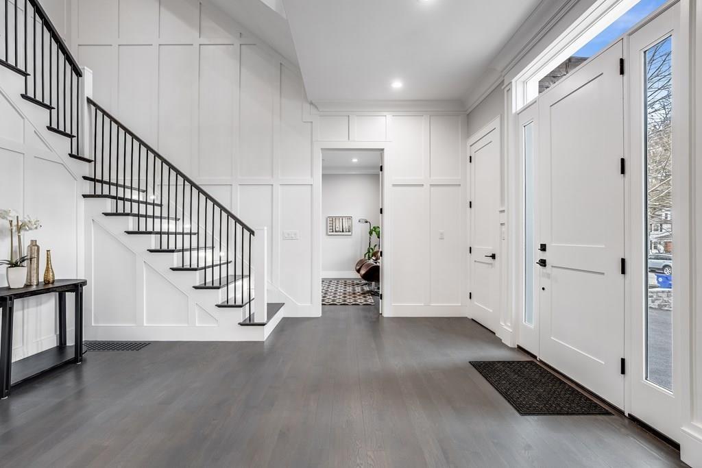 819 Dedham Street Newton, MA 02459 - Photo 2 of 40 a view of an entryway with wooden floor