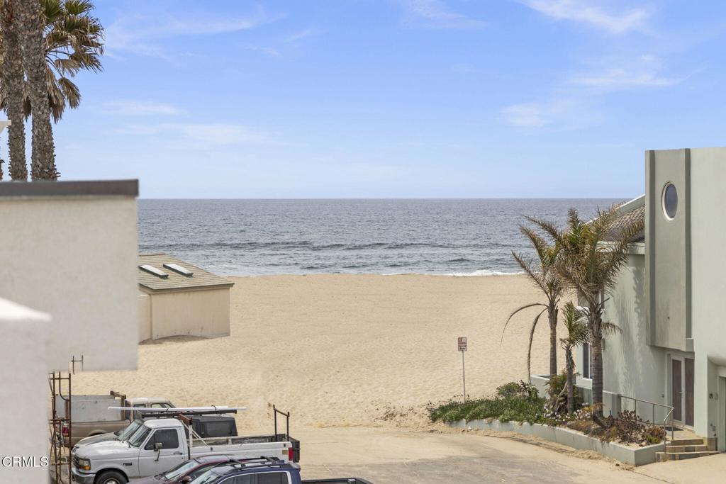a view of car parked on the side of the road