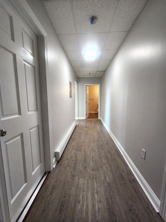 178 High Street, Unit 304 Clinton, MA 01510 - Photo 11 of 26 a view of hallway with wooden floor