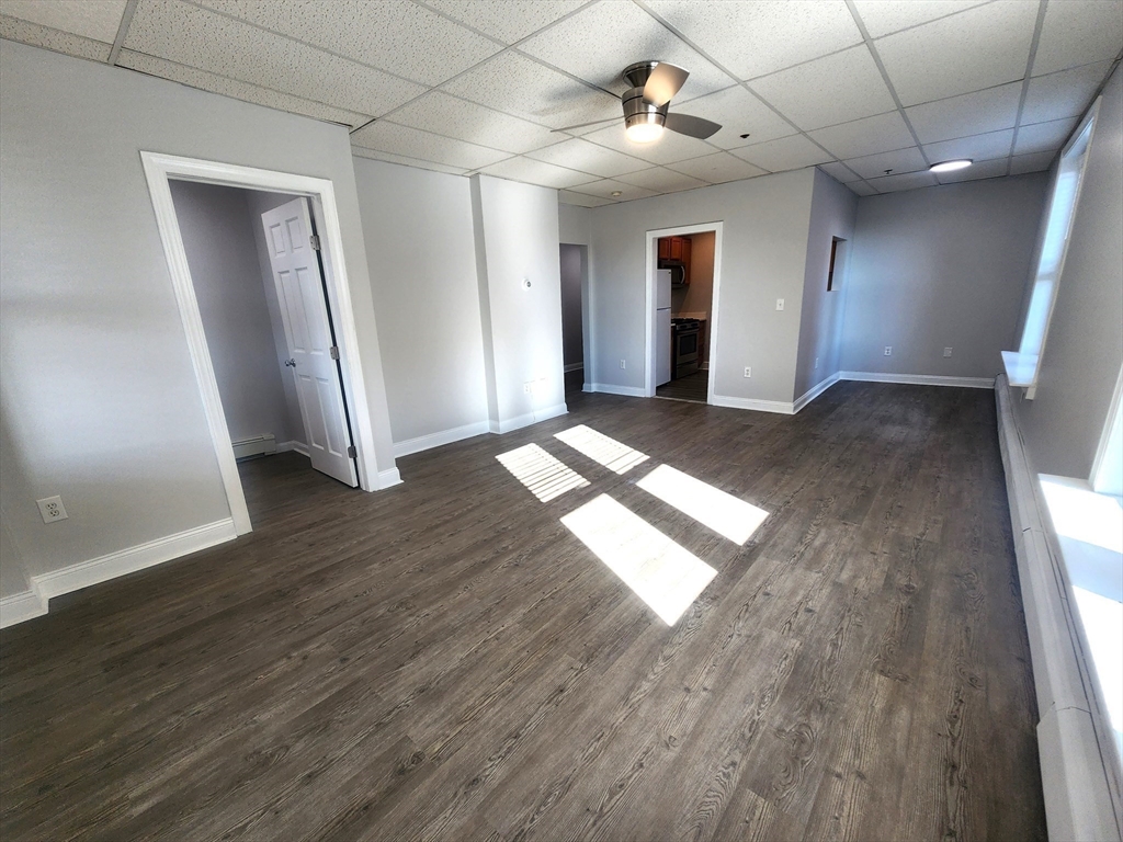 178 High Street, Unit 304 Clinton, MA 01510 - Photo 2 of 26 a view of entryway with wooden floor