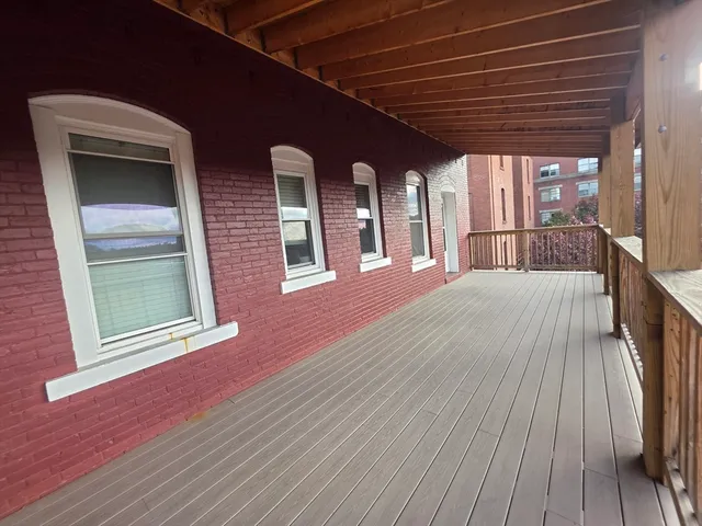 a view of a house with a barbeque